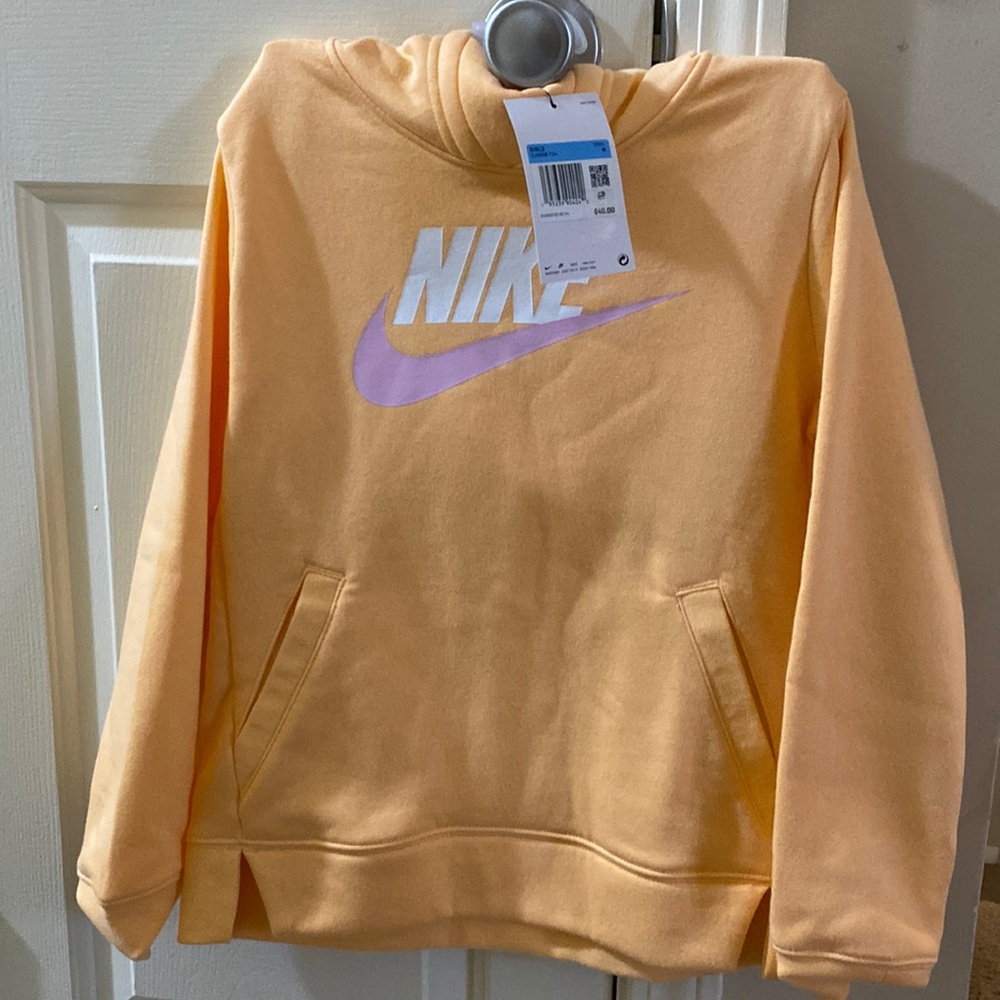 Nike light orange fleece hooded sweater Medium for girls